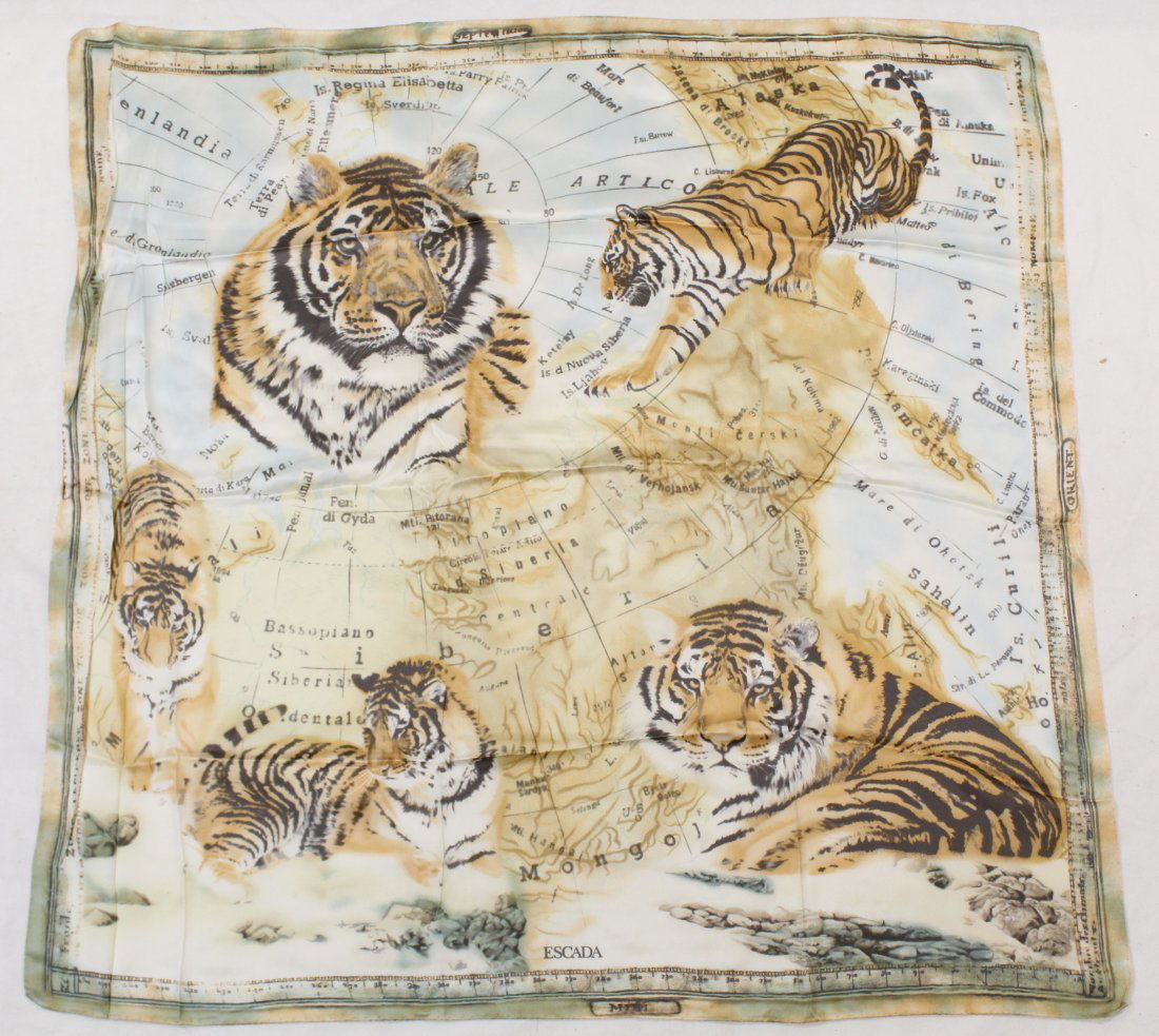 Escada Animal Print Silk Scarf: Siberian tiger motif. Rolled and stitched edges. Two small pin holes upper right corner; otherwise very good condition. 34" x 34" approx.