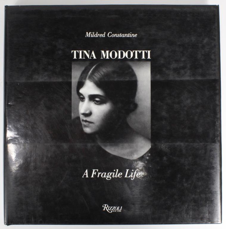 Tina Modotti Fragile Life Hardcover Photography: "Tina Modotti: A Fragile Life" hardcover photography biography by Mildred Constantine. Published by Rizzoli International, New York, 1983. Good condition, includes dust jacket with some wear along the