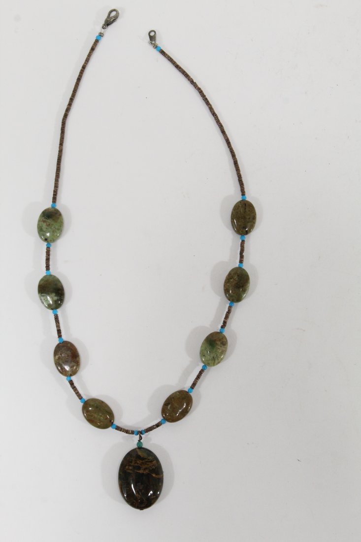 Sw heishi choker necklace with jasper decoration: Southwest heishi choker necklace brown beads howlite with 9 polished jasper beads and pendantDate 20th c Condition excellent no visible defects 18” Long,