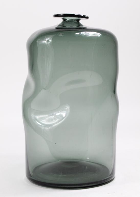 Scandinavian / Murano Style Art Glass Vase: Smokey glass with a slight greenish tint. Random pinched areas to side. No apparent signature. Slightly polished pontil. Excellent condition with some interior grime / dirt. 10.75" H x 6" dia. approx.