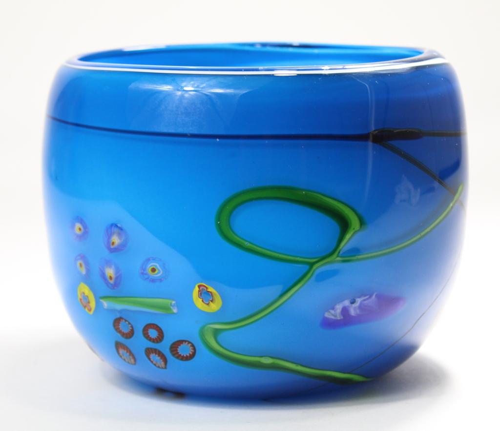 Studio Art Glass Low Vase / Bowl: Blue glass with multicolored swirls and inset millefiori cane pieces. No apparent signature or mark. Excellent condition. 5.5" H x 7" dia.