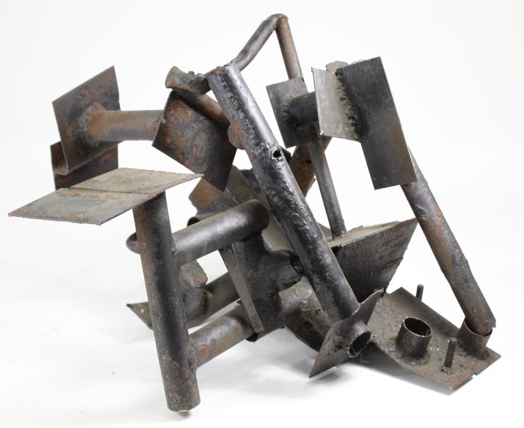 Vintage Brutalist Metal Sculpture: Brutalist metal sculpture made from found pipe and small panel pieces. No apparent signature. Good condition with age patina, etc. Circa 1960's/ 70's. 10.75" x 14.5" x 14" approx.