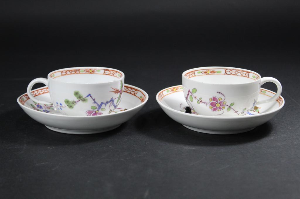 Marcolini Meissen KAKIEMON Cups & Saucers: Pair Meissen hand painted Kakiemon pattern cups with saucers. All with underglaze blue Marcolini period crossed sword marks. Very good condition; one cup with chip loss at bottom of handle. Cups 1 7/8