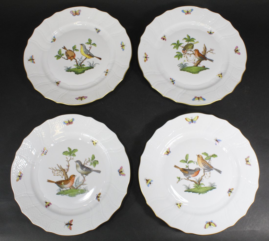 Herend Rothschild Bird Pattern Dinner Plates: Set of 4 Herend "Rothschild Bird" bird pattern dinner plates. Hand painted bird, butterfly, and insect motif with gilt rims. Impressed and blue Herend Hungary marks along with handwritten numbers. Exc