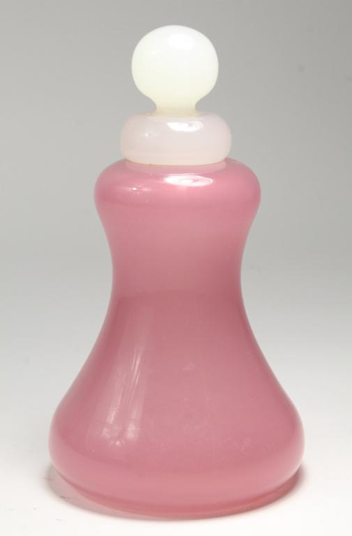 Steuben Attributed Rosaline Perfume Bottle: Large size bottle in pink rosaline glass with white alabaster lip and dauber staopper. Well polished pontil mark and bottom. Early 20th C. Excellent condition; slight blowing imperfections to opening.