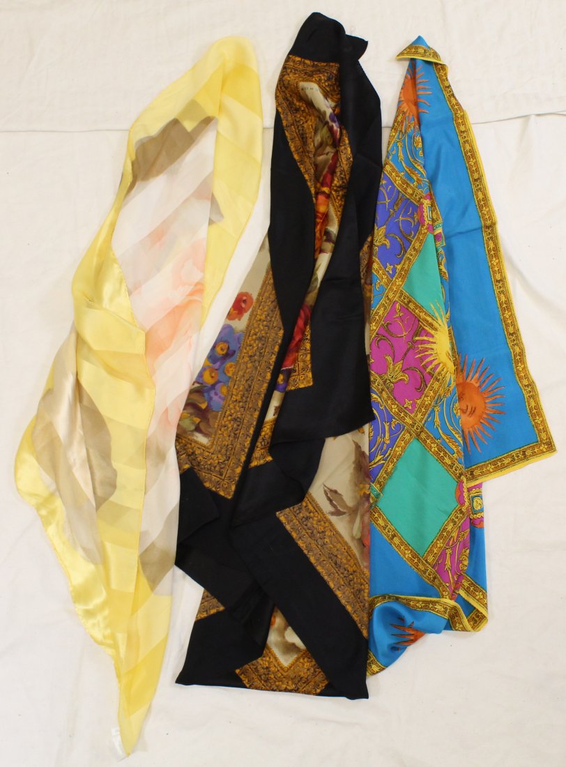 Vintage Escada & Echo Scarves (3 pc): Three silk with rolled hems. Escadas (each 33 x 34 in.) are charmeuse & chiffon prints in yellows & black. Echo scarf (41 x 40) in ecru silk, floral with black border. Slightly loved.