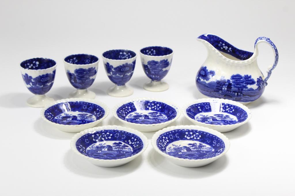 Copeland Spode's Tower Creamer, Butter, Egg Cups: Blue pattern with old marks and gadroon edges. (1) Creamer. 3 3/4" at handle. (2) Set of 5 butter pat dishes. 3 1/2" dia. (3) Set of 4 egg cups. 2 1/4" H. All very good condition; small flake chip to