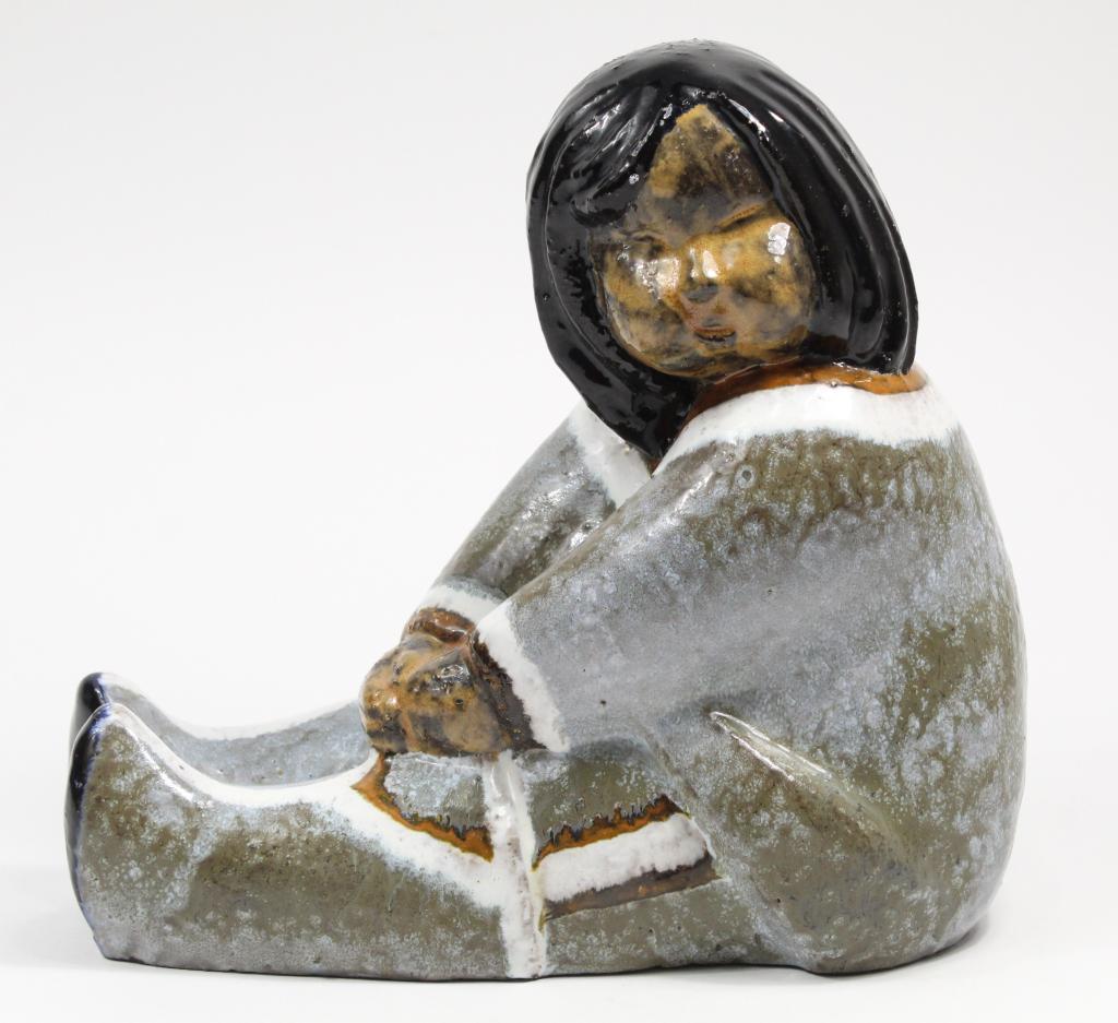 Upsala Ekeby Sweden Eskimo by Vicke Lindstrand: Heavy pottery seated Eskimo / Inuit figure in traditional costume. Designed 1947 by Vicke Lindstrand. Marked MADE IN SWEDEN. Goodcondition. 8.5" H x 9.25".