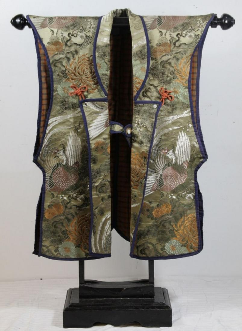 Japanese Robe Vest with Stand: Hand sewn vest of silk fabric panels. Cotton lining. Black lacquered stand 42.5" H x 30" W.