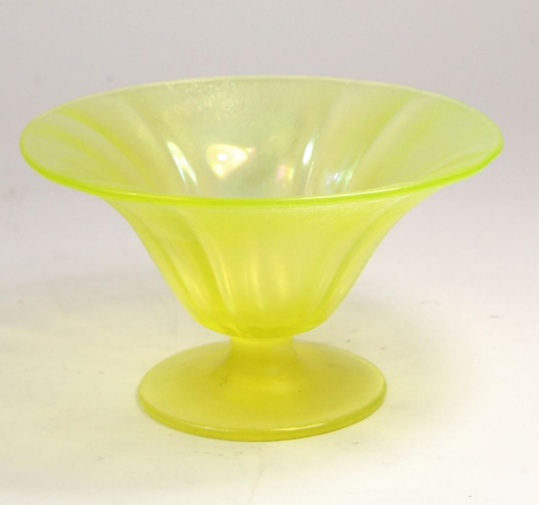 Antique Iridescent Stretch Glass Compote: Lemon yellow glass with iridescent onion skin surface. Three surface scratches to foot; otherwise excellnt condition. 4" H x 7" dia.