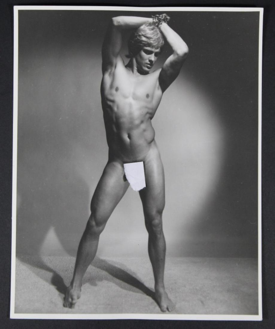 Vintage Western Photography Guild WPG Male Nude: Male nude model in studio pose with wrists chained. Stamped in purple "Western Photography Guild Box 2801 Denver, Colorado 80201" to the reverse. Silver gelatin print on smooth heavy fiber matte paper