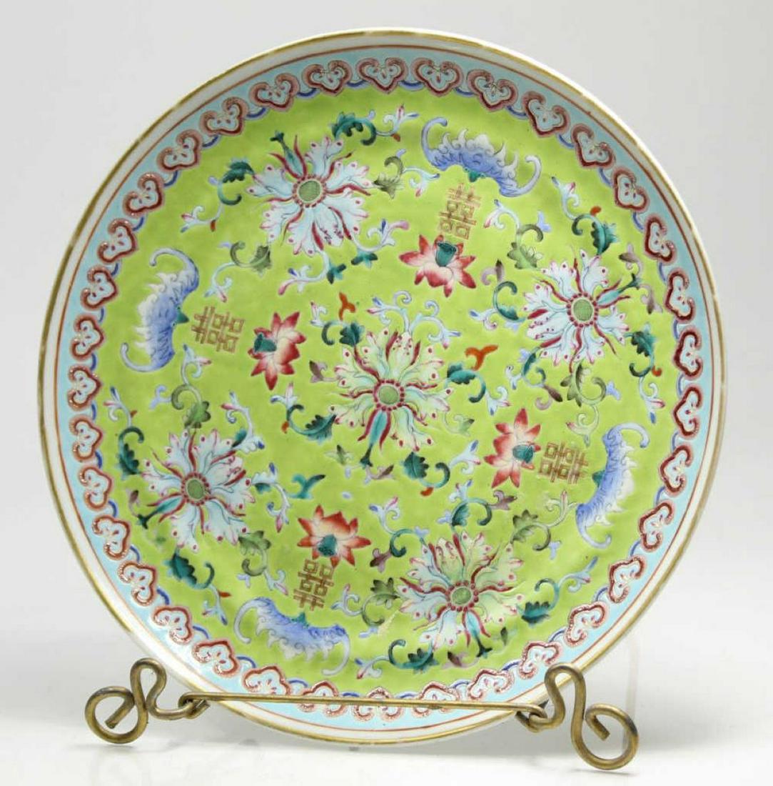 Chinese Export Plate w/ Double Happiness Symbols: 19th century plate with enameled flower and bat designs. Four recessed double happiness symbols in gilt. Exterior rim in green glaze decorated with three red bats. Unmarked. Excellent condition; some 
