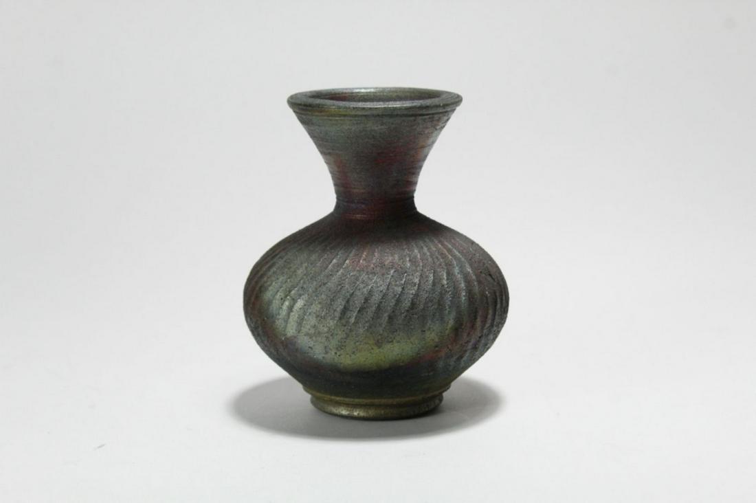 Chris Wolff (CO) Raku Pottery Vase: Small scale iridescent surface vase with incised signature to bottom. Excellent condition. 4.5" H.