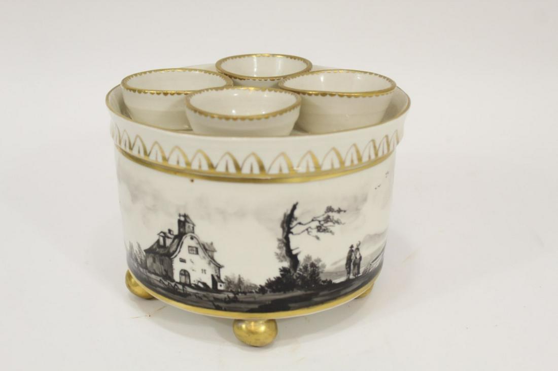 Continental Bulb Pot Tulipiere Creamware: Continental Covered Bulb Pot Grisaille creamware, cover with 4 openings, the base with a grisaille outdoor european design, gilded decoration with 5 feet. Underglaze blue mark and BG mark on base, C 1