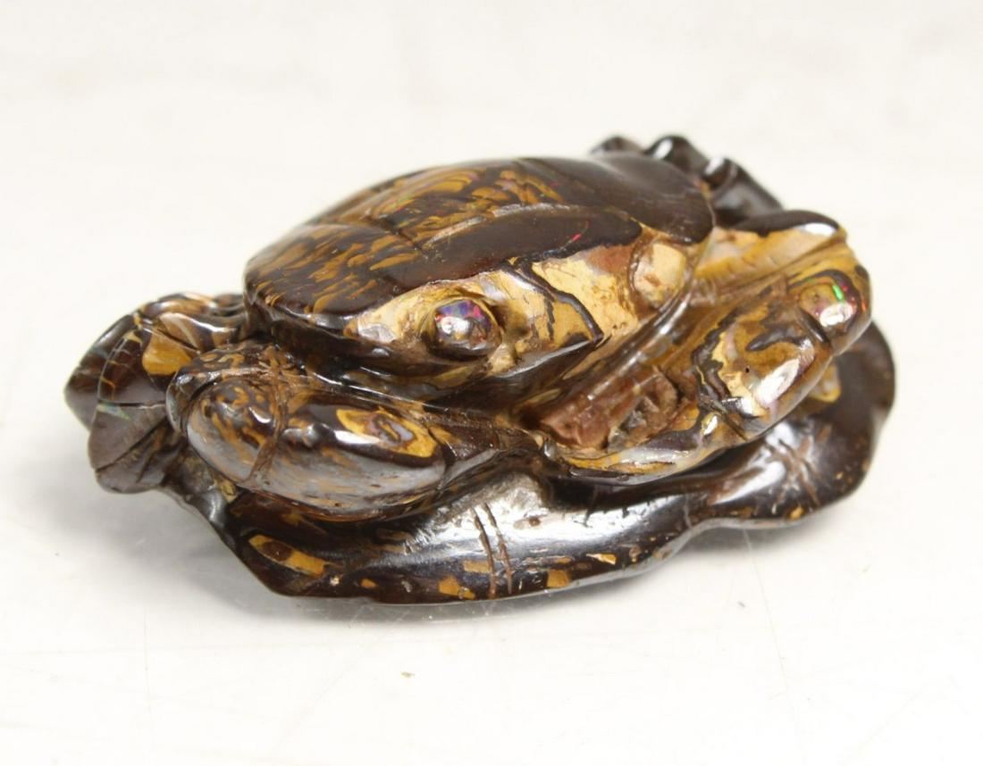 Chinese Brown Opal Crab Small Carving: Chinese Brown Opal Crab Small Carving with the crab sittingon a lotus leaf, brown stone with some fire opal showing, light surface wear, 1.5 " X 1.25"