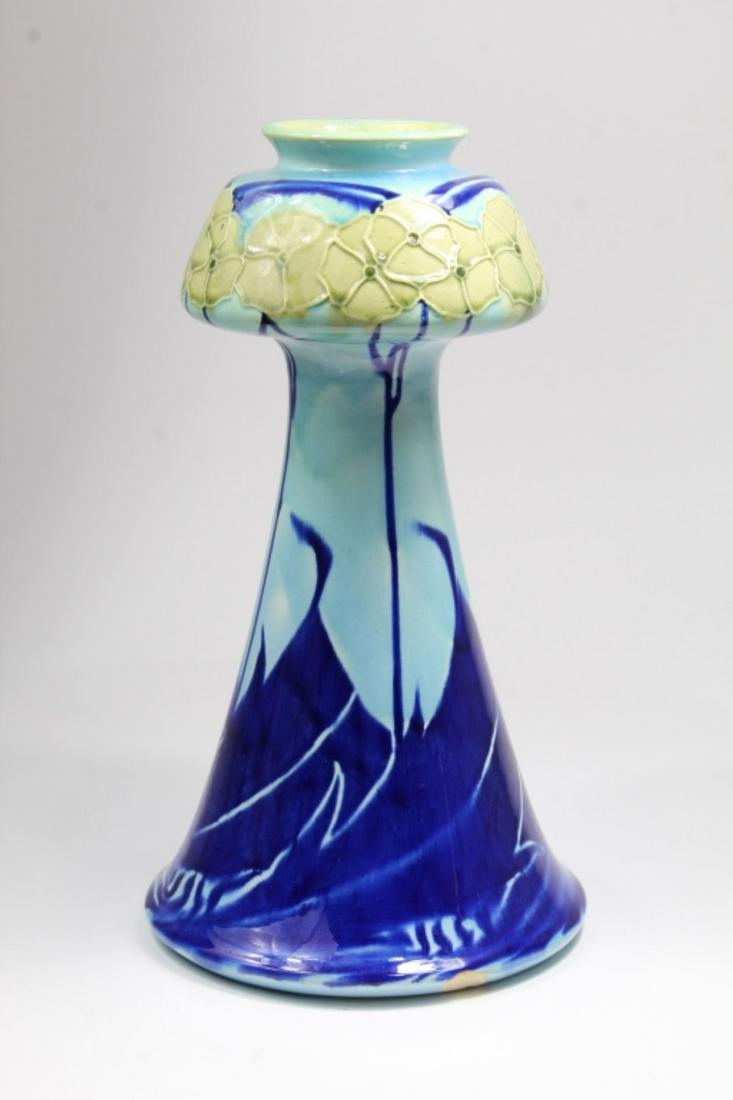 Minton Secessionist Vase 1904: Raised hydrangea flower motif to upper portion. Mintons LTD mark to bottom along with impressed 1904 date code and 3540. Two chips to lower bottom edge; otherwise very good condition. Expected crazing