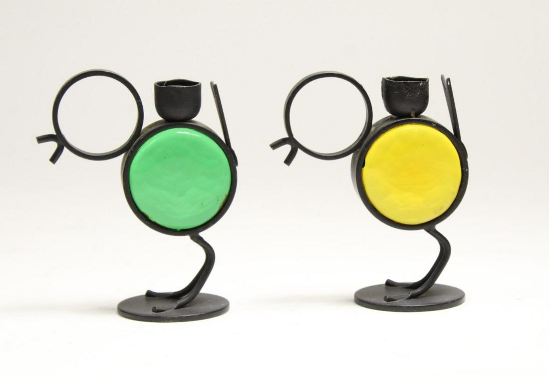 Pair Gunnar Ander Sweden "Chick" Candleholders: Pair Gunnar Ander Iron & Glass Bird "Chick" Candleholders. 'Ystad Metall Made in Sweden' mark on bases. Midcentury design with iron and colored glass (green & yellow), fits 1/2" diameter candle. Each