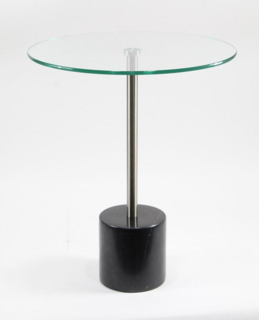 Marble Pedestal Base Glass Top Side Table: Contemporary Marble Pedestal Base Glass Top Side Table in the style of Francesco Rota's 'Jey' Side Table. Black marble base, steel support and glass top. Measures 21" tall and 17.5" in diameter. Excel