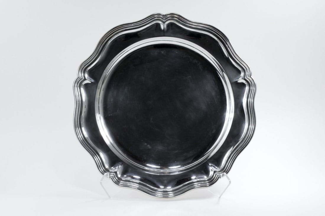 Large Camusso Peru Sterling Silver Round Tray: Large Georgian style round sterling tray. Marked INDUSTRIA PERUANA PLATA ESTERLINA 925 CAMUSSO with flag logo to underside of lip. Good condition; small dent to bottom side. Some losses to lacquer sur