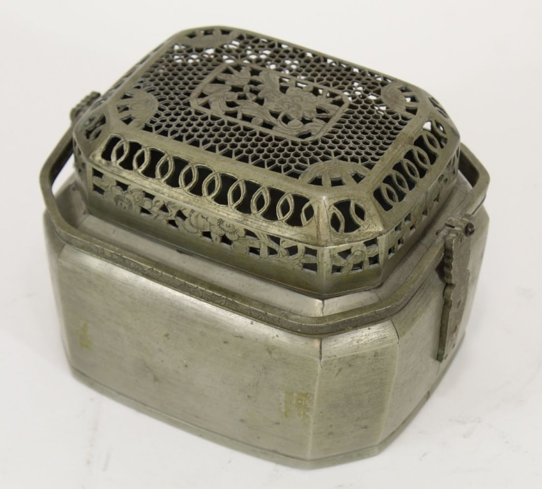 Antique Chinese Silvered Brass Hand Warmer: Pierced lid. Etched designs to double handles. Unmarked. Circa late 19th/ early 20th C. Good condition with old surface patina. 4" H x 6" x 4.75" approx.