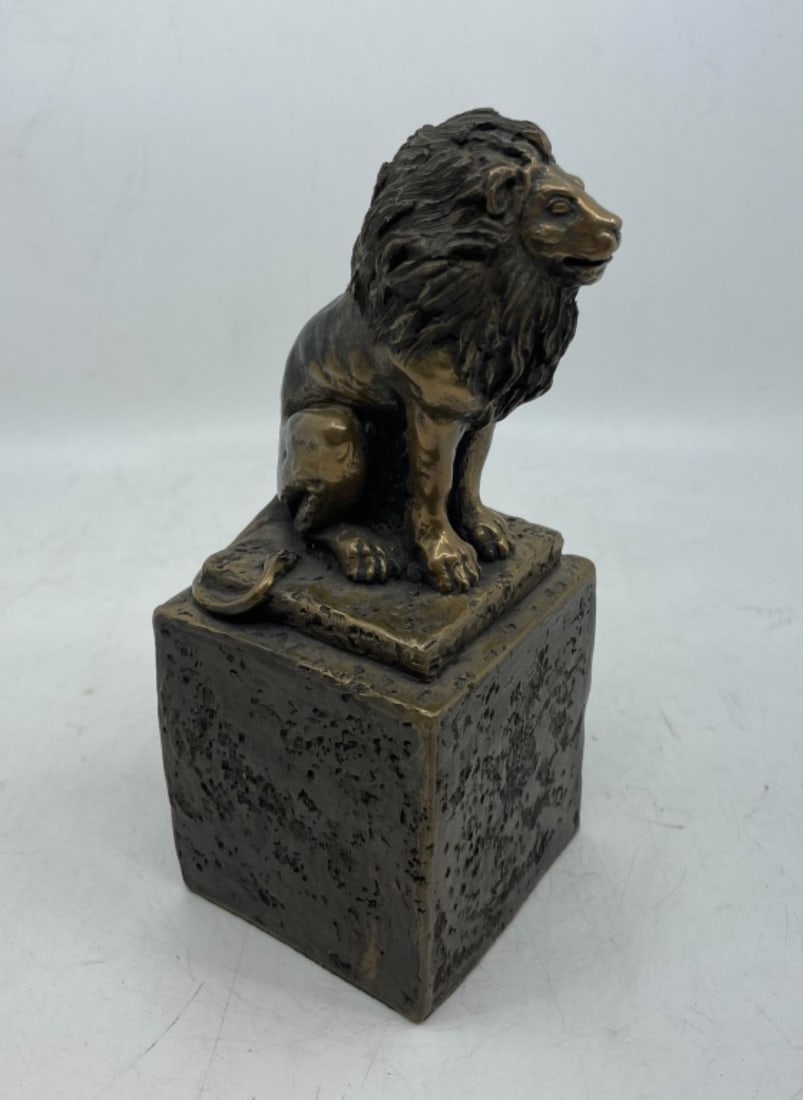 Joseph Addotta Lion Sculpture / Hamilton Studios: Lion sculpture in heavy cast material with thick bronze covering. Marked ADDOTTA '87. Excellent condition. 7.75" H x 3" x 3".