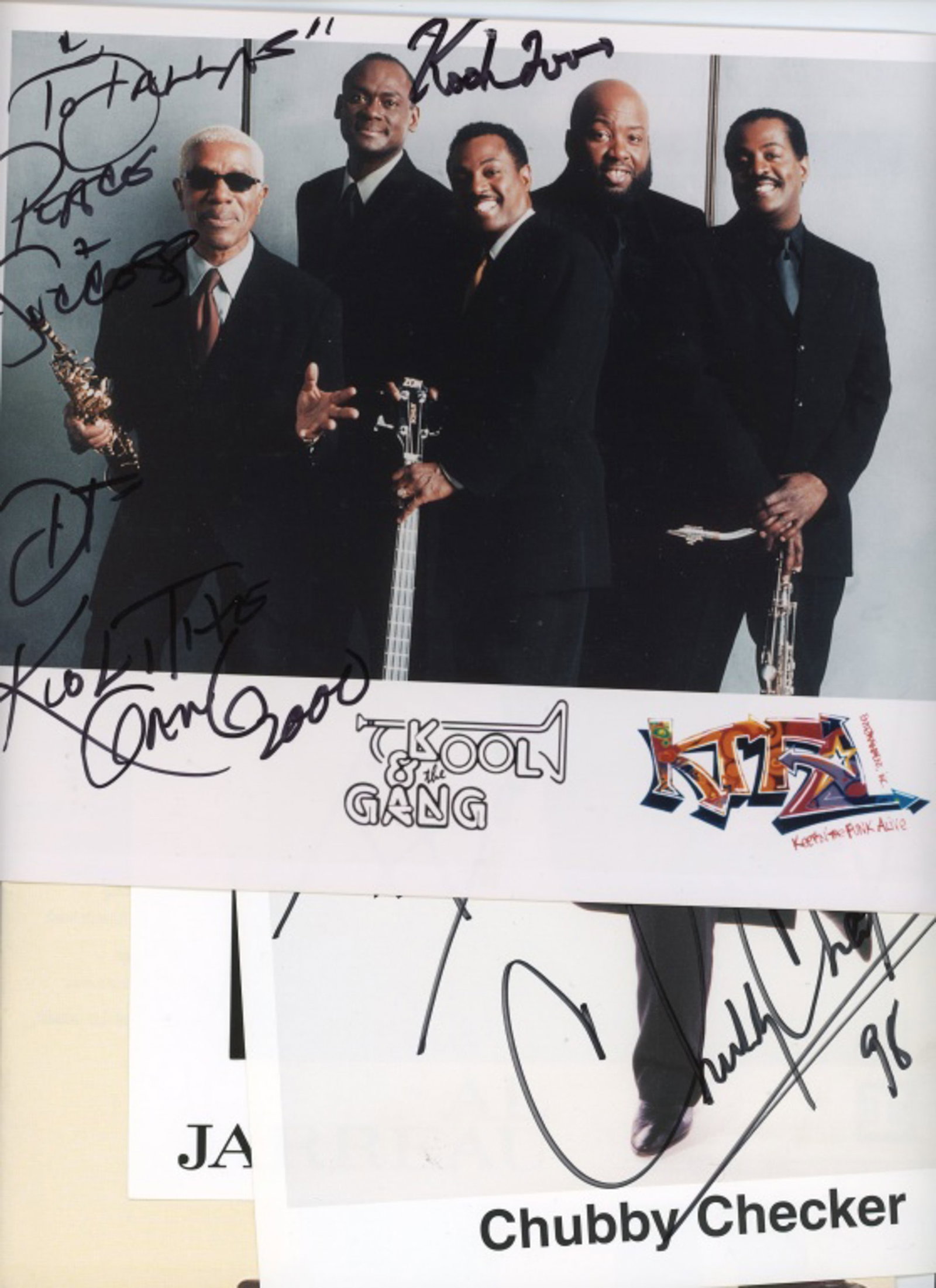 Group 4 Signed Music Publicity Shots & Magazine: Group 4 Signed Music Publicity Shots & Magazine. Includes (1) Kool and the Gang signed group photo (2) Chubby Checkers signed photo (3) Al Jarreau signed photo (4) Earl Klugh and Bob James signed 98.9