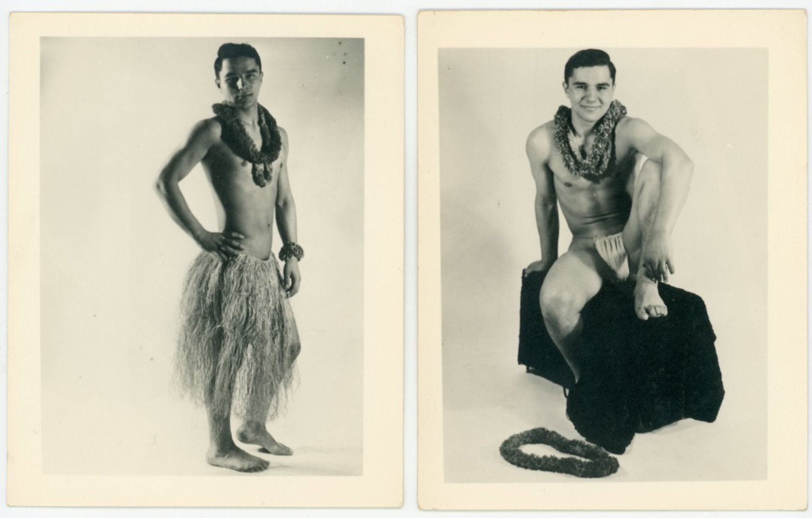 Kris Studio Male Physique Beefcake Photographs: Two vintage original 4" x 5" Chuck Renslow / Kris Studio photographs. (1) Standing model posed wearing grass skirt and leis. Three small negative flaw black spots upper right corner. (2) Same model in