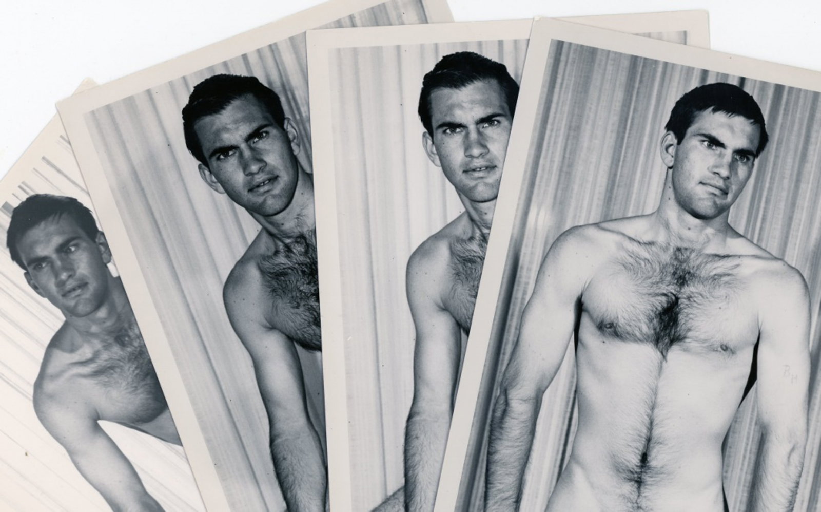J. Brian Male Nude Physique Photographs: Group of four 1960's 5" x 8" gloss B/W photographs of a model posed in apartment setting. Two photos of same image in slightly different tones. Good condition; a few margin dings, etc.