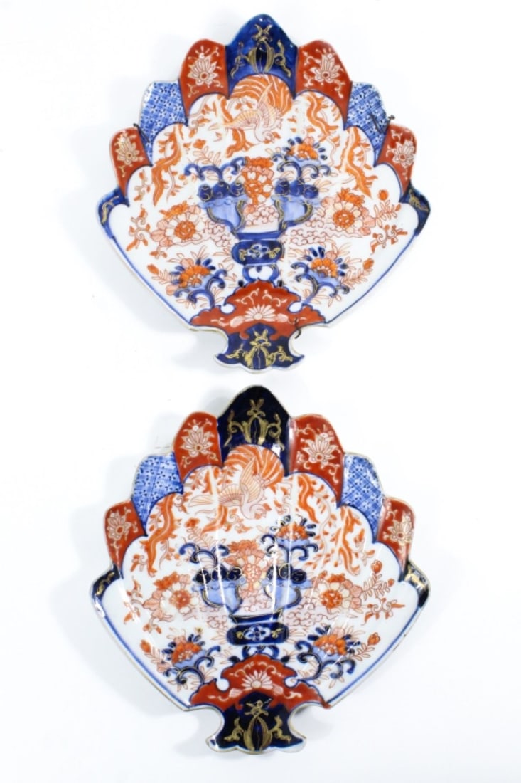 2 Japanese Imari Fan form Plates Meiji period: 2 Japanese Imari Fan form Plates Meiji period. Porcelain with raised design for individual section and gold rim with gold , blue and red enamels and underglaze blue oalso on the base with 3 treasure d