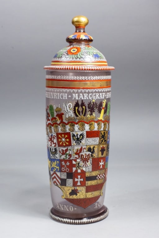 Antique German Enameled Humpen Beaker: Antique German Enameled Humpen Covered Beaker. Elaborately painted blown glass covered beaker with large coat of arms on front and floral motif at back. Beaker has date of 1661 at base although consig