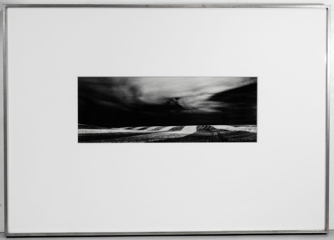 Don Kirby Framed Wheatfield Eastern Wa. Photo: Don Kirby Framed Photo "91052 WHEATFIELD, EASTERN WA 1991" Silver painted wood frame, very good condition, unexamined out of frame. Framed measurements are approx 24" x 34" and inside mat measurements