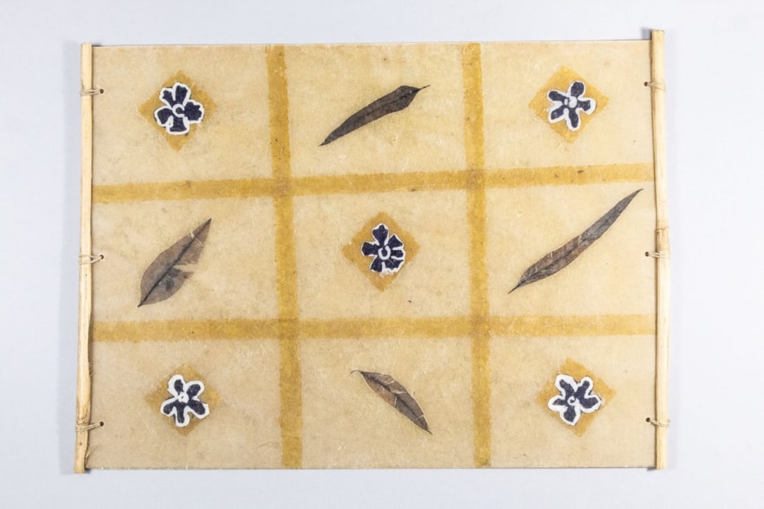 Mid Century Modern Fiberglass & Leaf Placemats: Collection of 14 mid-century modern Japanese fiberglass placemats imbedded with natural leaves. Includes 5 large round placemats (15.25" dia. approx.), 8 larger rectangle placemats with tied bamboo ed