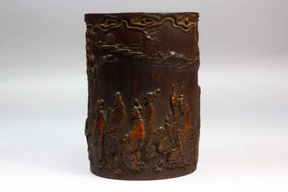 Chinese Bamboo Brush Pot Outdoor meeting: Chinese Bamboo Brush Pot with an intricate carved continuous outdoor meeting of scholars scene. Dark finish , light wear , approx. 6.5" high X 4.5'"diameter.