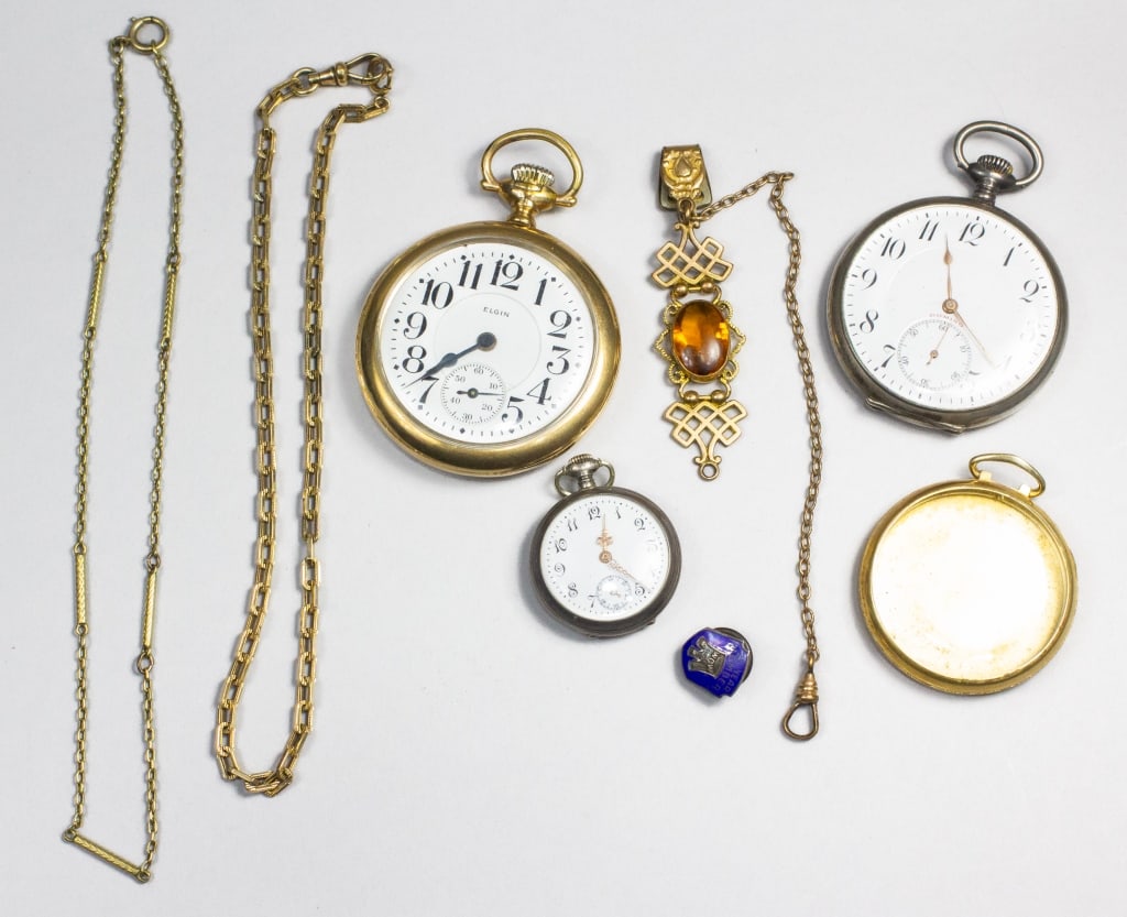 Watches, Fobs & Watch Parts: (1) A lady's silver metal 1-1/8" diam. pocket watch, Rosette 162984, 4 (XI) and "WOW 1902" are engraved on inside cover, and monogram LB. Watch has white face, 3 yellow gold hands, black script numera