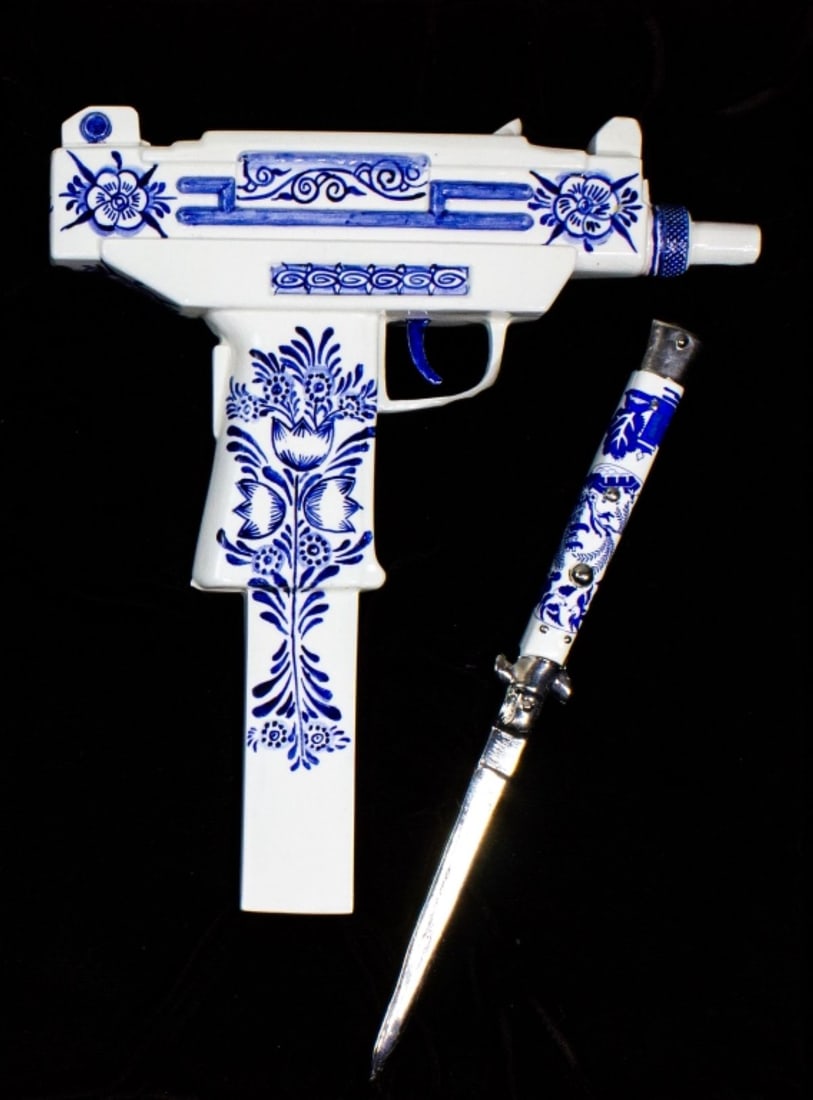 Charles Krafft (WA) "Assassin's Kit (Uzi)", 2000: Charles Krafft (1947-2020 Washington) "Assassin's Kit (Uzi and Switchblade in case)", 2000. Fitted box. Includes (1) Disasterware cast porcelain Uzi gun handpainted with Delft-style decoration in coba