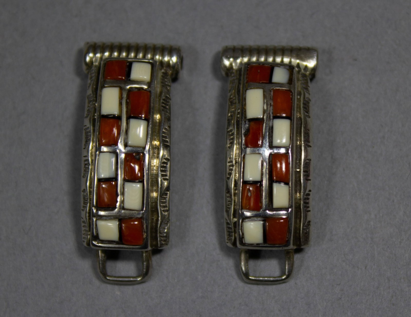 Gladys Smith Navajo Inlaid Sterling Watch Tips: Vintage women's watch band tips by Navajo artist Gladys Smith. Channel set inlay of carnelian and white shell separated by slivers of black onyx. Back of one tip hand engraved "Parts Carnelian Hand Ma