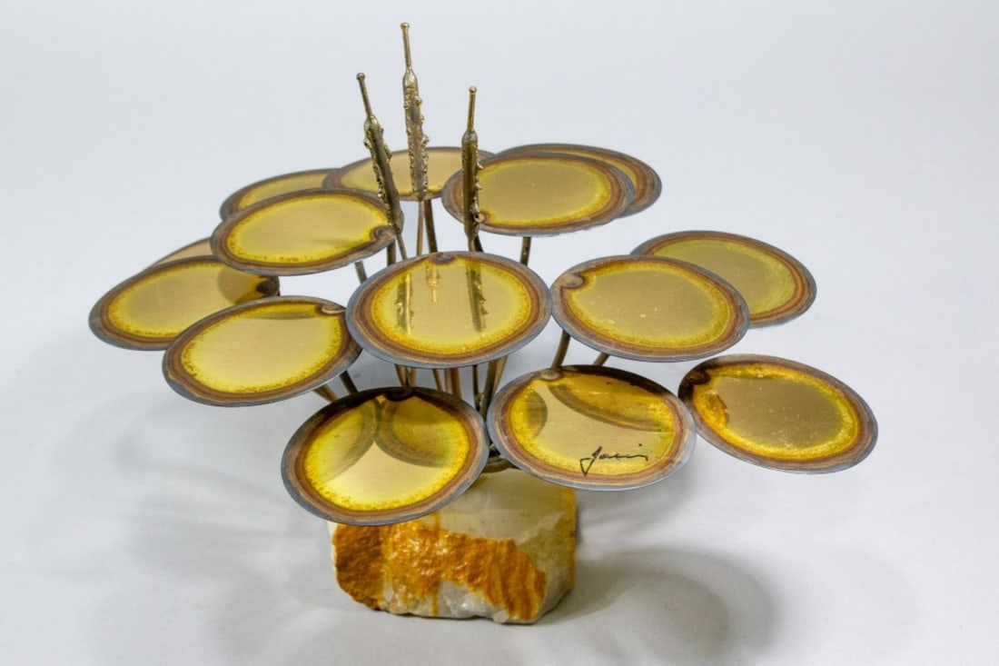 Mid Century Mario Jason Metal Sculpture: Welded brass lily pads and cattails mounted in onyx stone base. Signed Jason. Excellent condition. 9.5" H x 14.5" x 11.5" approx.