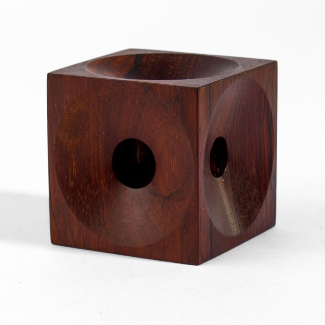 Ernst Henriksen Denmark Cube Candle Holder: Candle holder by Ernst Henriksen of Denmark. In rosewood with attractive dark grain. Stamped "E.H. Denmark" on underside. In good condition. Measures 2.25" on all sides approx.
