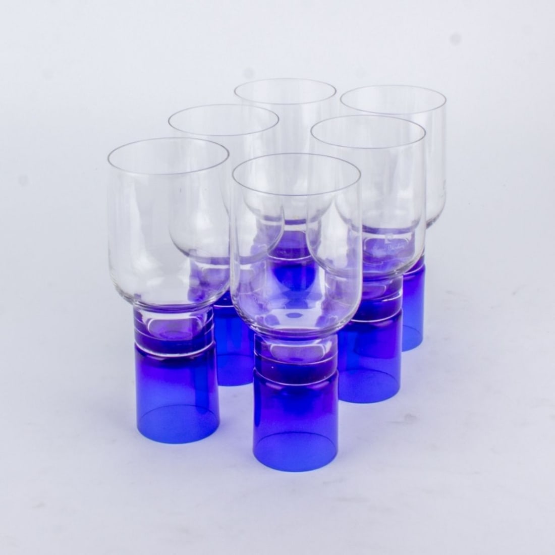 Set of 6 Pierre Cardin Cocktail Glasses: Set of 6 Pierre Cardin Double Sided Cocktail Glasses. Logo and signature on each cup. Cobalt base serves as shot glass or cordial, clear glass is perfect for cocktails or wine. Each glass measures 7"
