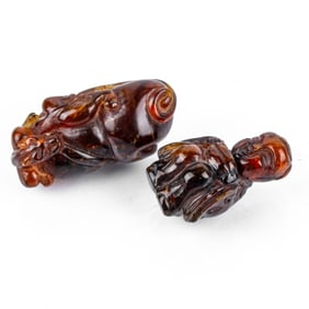 Two Japanese Carved Baltic Amber Netsuke