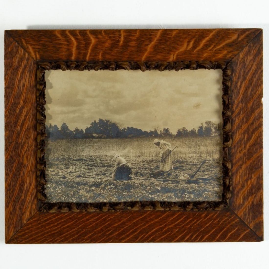 Rudolf Eickemeyer "Sweet Potato Field" Photograph: "The Sweet Potato Field", circa 1898. Gelatin silver print depicting two Black women working in a sweet potato field. Not examined out of peroid oak frame; appears in good contion with a few toning /