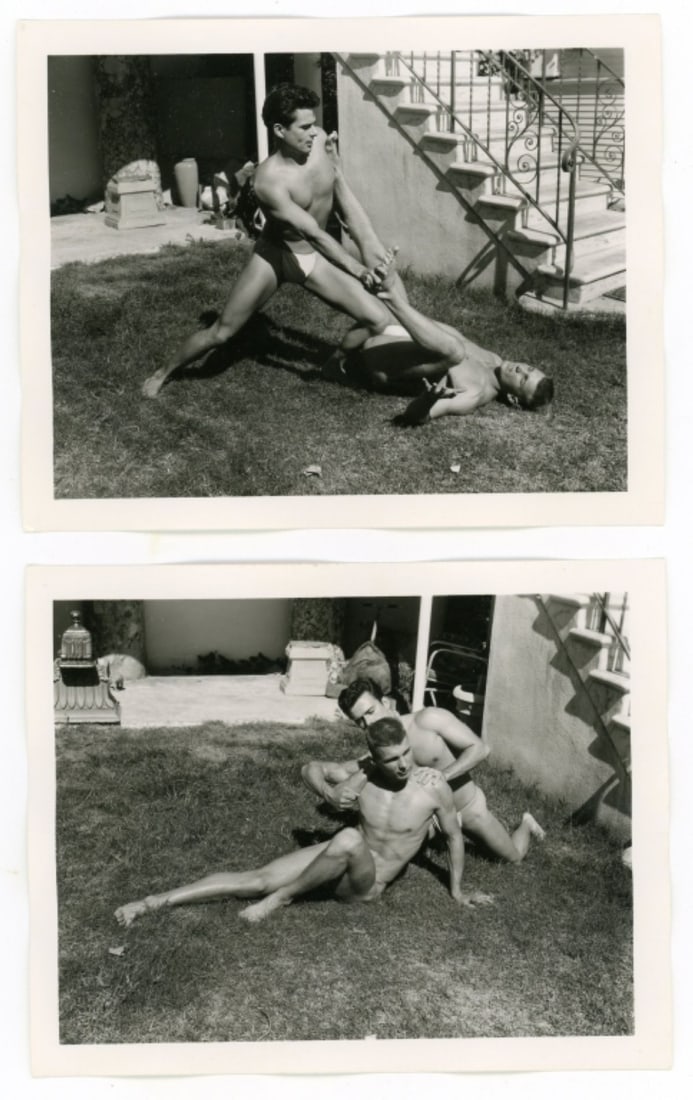 Bob Mizer AMG Nude Male Photos / Dave Wiler: Two vintage original AMG photographs of two models wrestling outdoors at Bob Mizer's compound; from the estate of the dark haired model pictured. Pencil written 15 and 29 to the backs. Good sharp imag