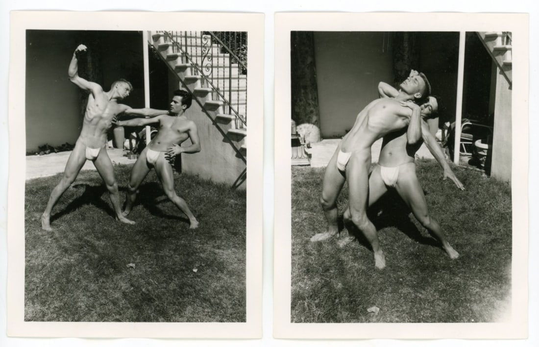 Bob Mizer AMG Nude Male Photos / Dave Wiler: Two vintage original AMG photographs of two models wrestling outdoors at Bob Mizer's compound; from the estate of the dark haired model pictured. Pencil written 11 and 16 to the backs. Good sharp imag