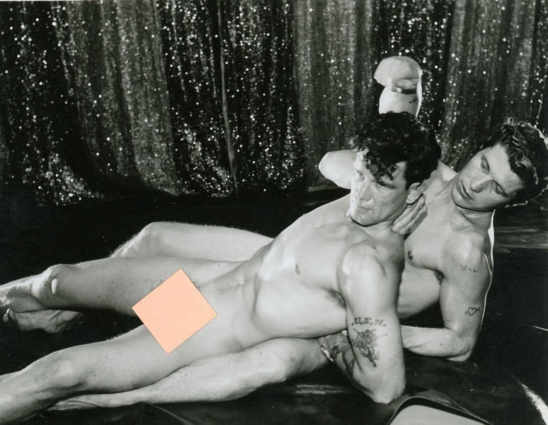 Bob Mizer AMG Male Nude Photograph: Original Bob Mizer / AMG photograph of two tattoed male nude models in wrestling pose. Clear sharp image on gloss paper. Good condition; some darkroom developing surface spots when viewed at an angle.