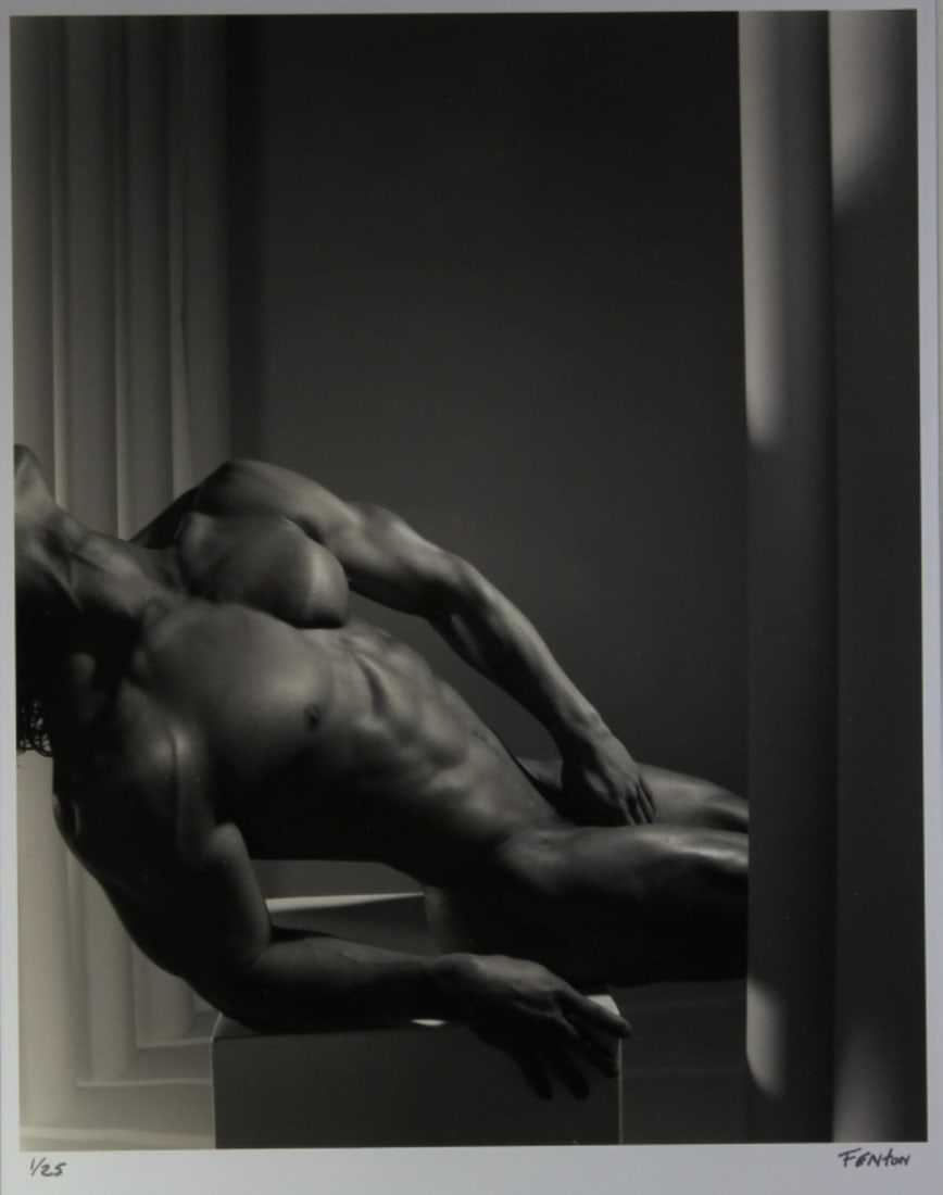 Male Nude Photograph Signed Fenton: Silver gelatin photograph of nude man posed with tubes. Numbered 1/ 25 and signed Fenton in silver ink to lower margin. Clear sharp image on satin paper. Metal frame. Mat opening 13.5" x 10.5". Frame 