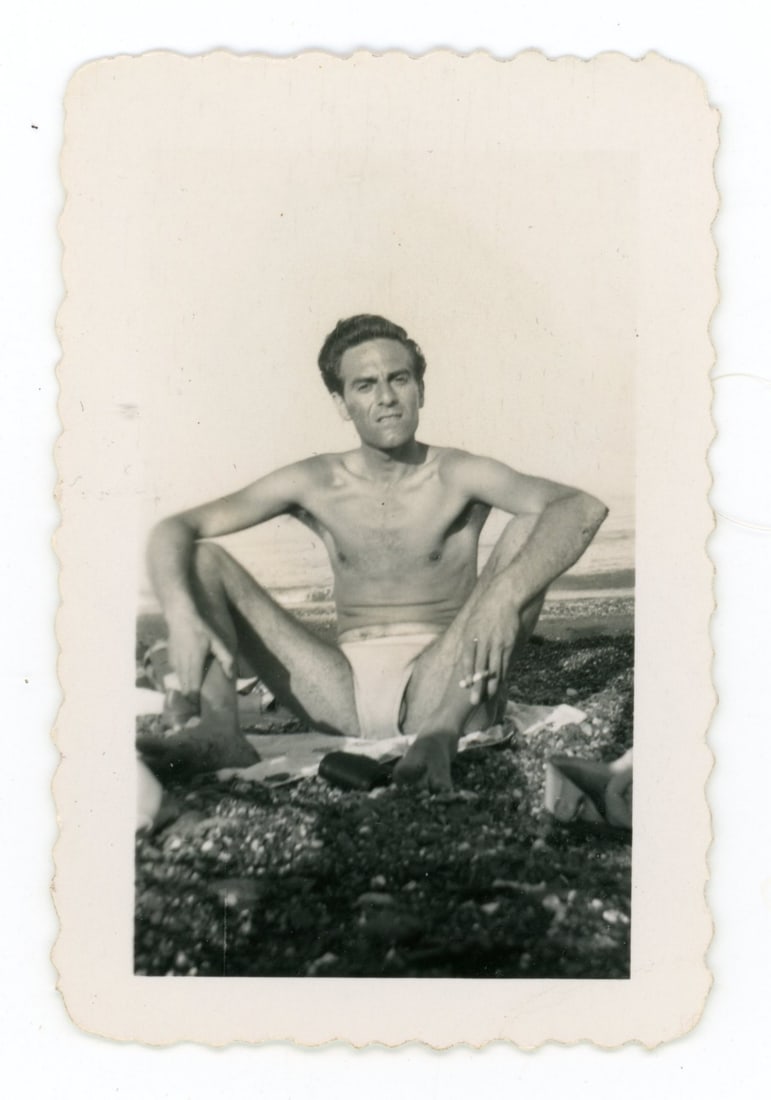 Vintage Photographs Men in Bathing Suits: (1) Small photo of man on beach with bathing suit "slip". 2 3/4" x 1 7/8". (2) Mini photo album with 9 photos of men at a lake. 3 3/4" x 6". (3) Men on a dock. 3 1/2" x 5"