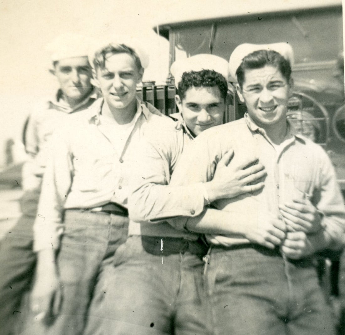 Affectionate Sailors / Soldier Photographs: Group of 3 photographs. (1) Affectionate group of sailors. 4' x 3". (2) Young soldier posed wearing shorts. 4" x 2 5/8". (3) Shirtless men in shorts playing football; slightly blurred. 3 1/4" x 4 1/2"