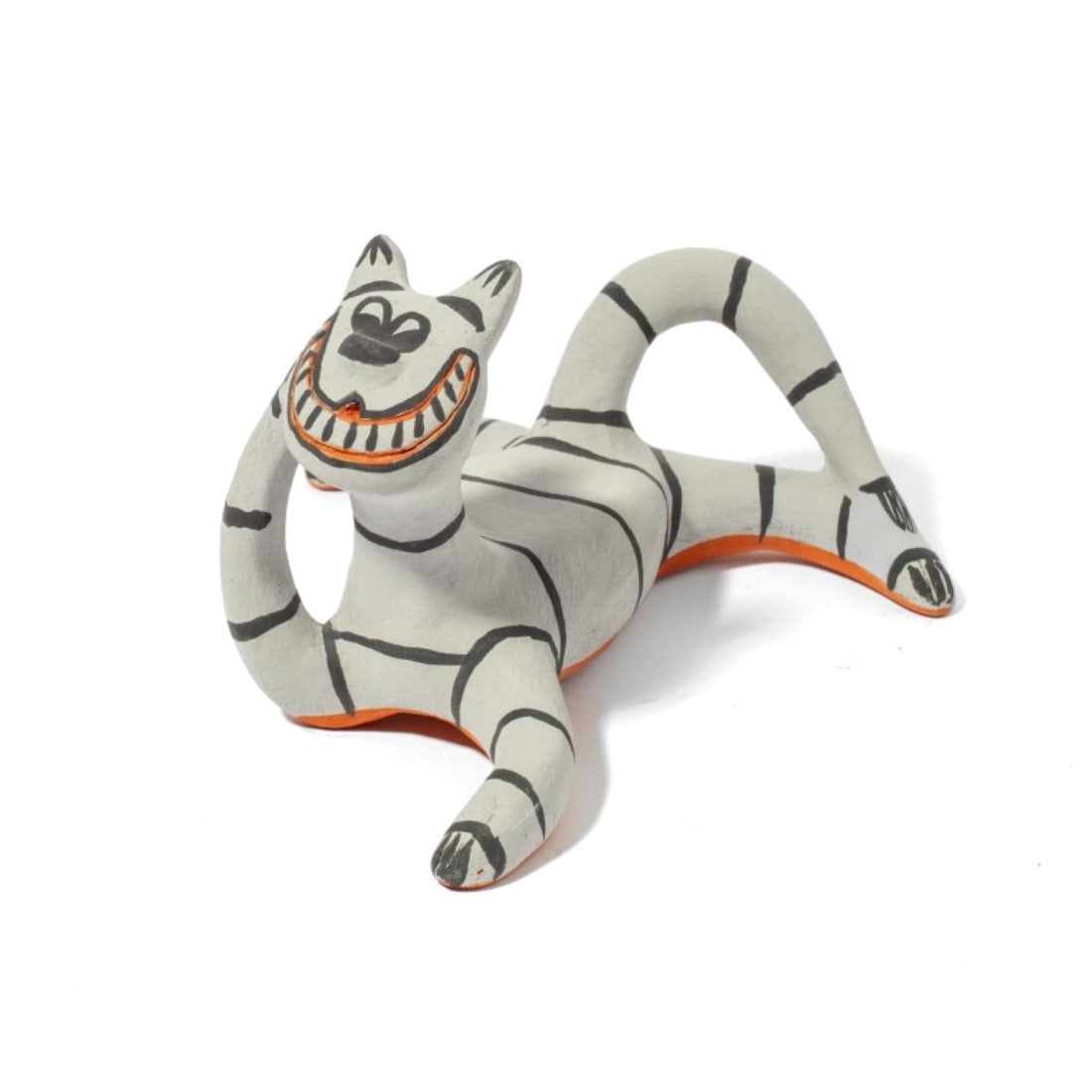 Martha Arquero Cochiti Pueblo Cheshire Cat Effigy: Martha Arquero (b. 1944) Cochiti Pueblo Cheshire Cat Effigy Figure. Hand-modeled cat with wide grin, painted in grey and black slip on a terracotta ground. Signed “Martha Arquero Cochiti” at b