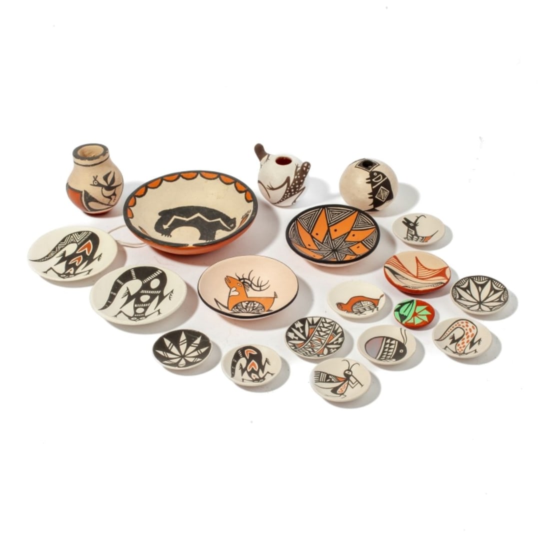 Group 19 Acoma / Kewa Pottery Small Dishes: Group 19 Acoma / Kewa Pottery Small Dishes. Lot includes (9) small dishes with handpainted capybara, insect, lizard, goat and geometric patterns in red and black slip. Signed "BR" and "Routzen" on bas