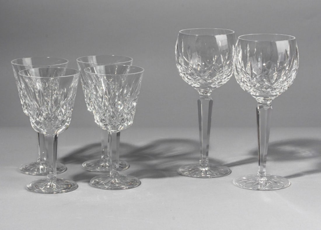 Waterford LISMORE Wine Glasses / Jim O'Leary: Waterford "Lismore" pattern cut crystal wine stem glasses. (1) Set 4 claret wine glasses with hand etched Jim O'Leary signatures. 5 78". (2) Pair hock wine glasses. 7 1/2". All good condition.